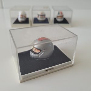 4x mini helmets, Andretti, Scheckter, Amon, Bell